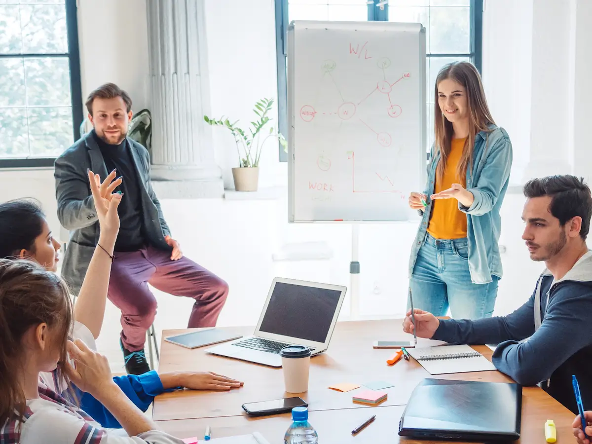 Group of learners with professor actively interacting